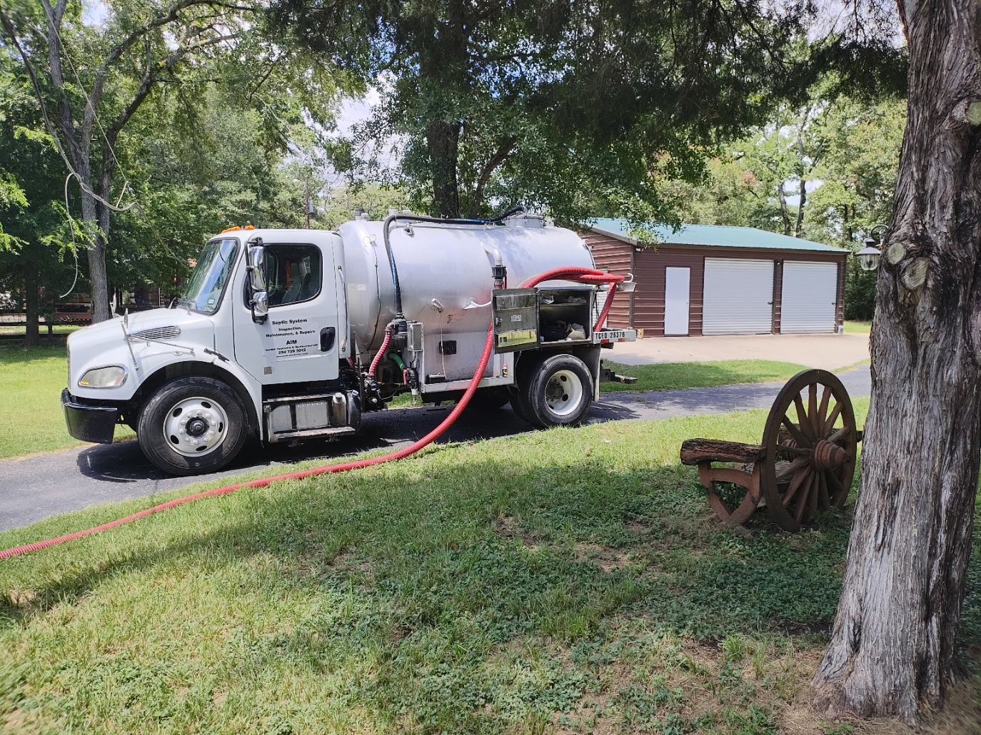 Pump truck pumping sewage.